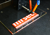 Printing of the MRSEC logo in two-color wax and two-color silicone